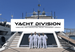 Four men on the aft deck of a luxury yacht